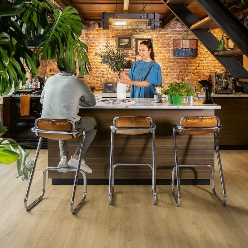 Close-up of Quick-Step Capture Brushed Oak Warm Natural laminate flooring showing grain texture