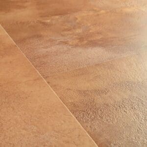 Quick-Step Muse Terracotta Laminate Flooring MUS5490 close-up showing water resistance with droplets on surface