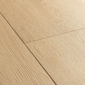 Close-up detail of Quick-Step Capture Brushed Oak Natural laminate flooring showing authentic wood grain pattern