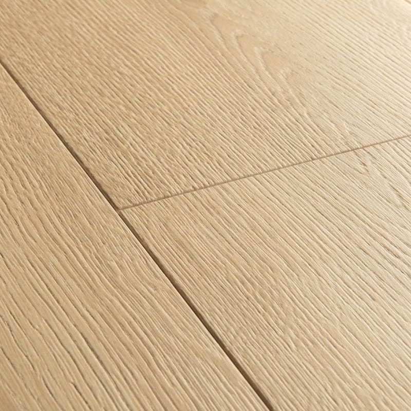 Close-up detail of Quick-Step Capture Brushed Oak Natural laminate flooring showing authentic wood grain pattern