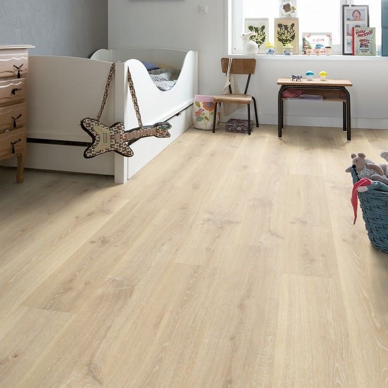 Quick-Step Creo Tennessee Oak Light Wood laminate installed in a child's bedroom