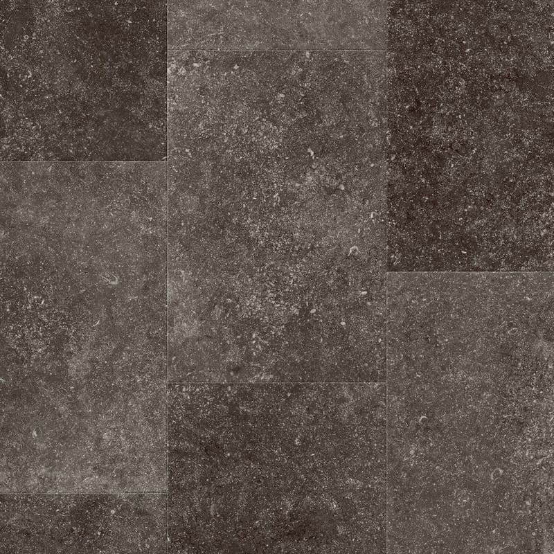 Quick-Step Muse Fumed Bluestone laminate flooring sample showing dark grey stone-effect tiles with natural speckles and variations