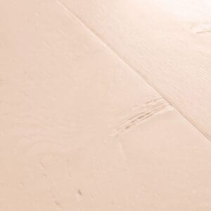 Detailed view of Painted Oak Rose laminate plank showing texture and color