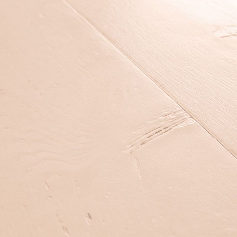 Detailed view of Painted Oak Rose laminate plank showing texture and color