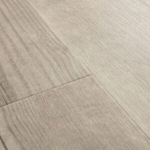 Close-up detail of Quick-Step Alpha Bloom Morning Mist Pine vinyl flooring showing wood grain texture