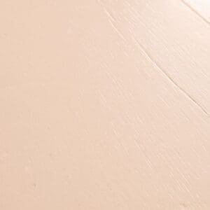 Close-up of Painted Oak Rose laminate showing detailed wood grain texture and soft pink finish