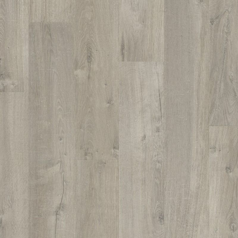 Close-up of Quick-Step Impressive Soft Oak Grey laminate flooring showing authentic wood grain texture and beveled edges