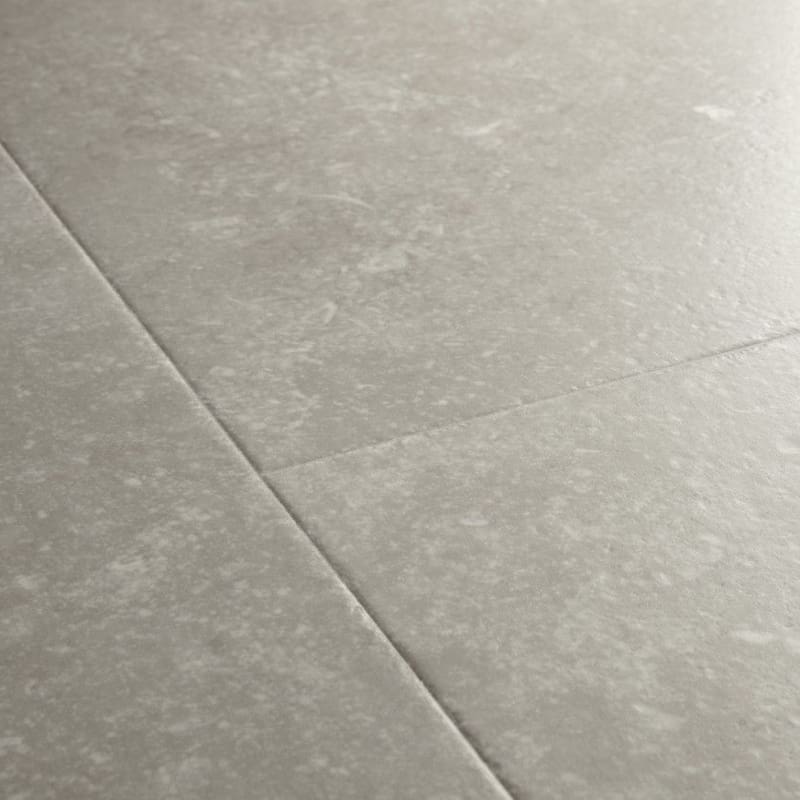 Close-up of Dusky Bluestone laminate flooring with water droplets showing waterproof properties