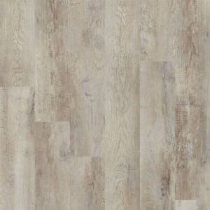 Moduleo Roots Country Oak 54925 luxury vinyl flooring displaying warm beige wood-effect planks with realistic knots and grain details