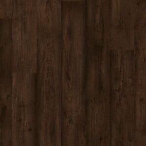 Close-up of teal chair on Quick-Step Waxed Oak Brown laminate flooring showing rich brown tones