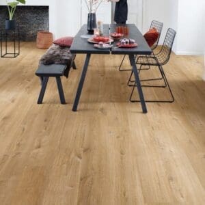 Modern dining room with Cotton Oak Natural flooring featuring white walls and black dining table