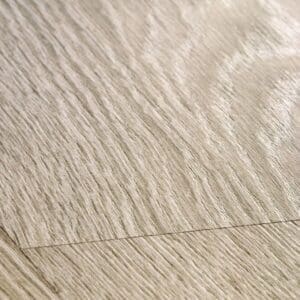 Close-up detail of Quick-Step Classic Old Oak Light Grey laminate flooring showing texture and grain