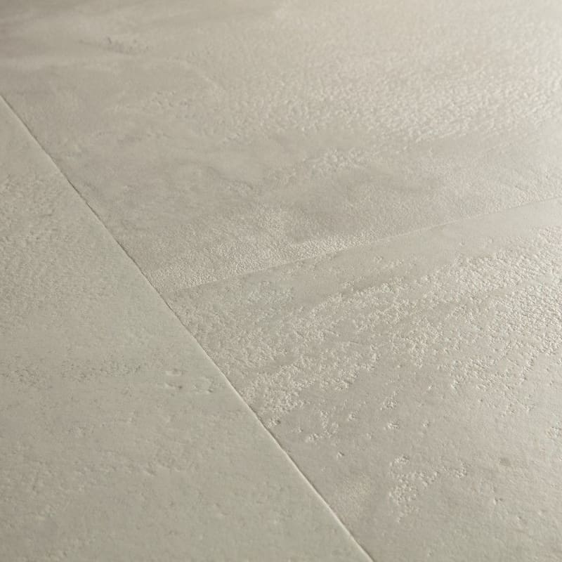 Full room view of Quick-Step Grey Concrete Laminate flooring installation pattern