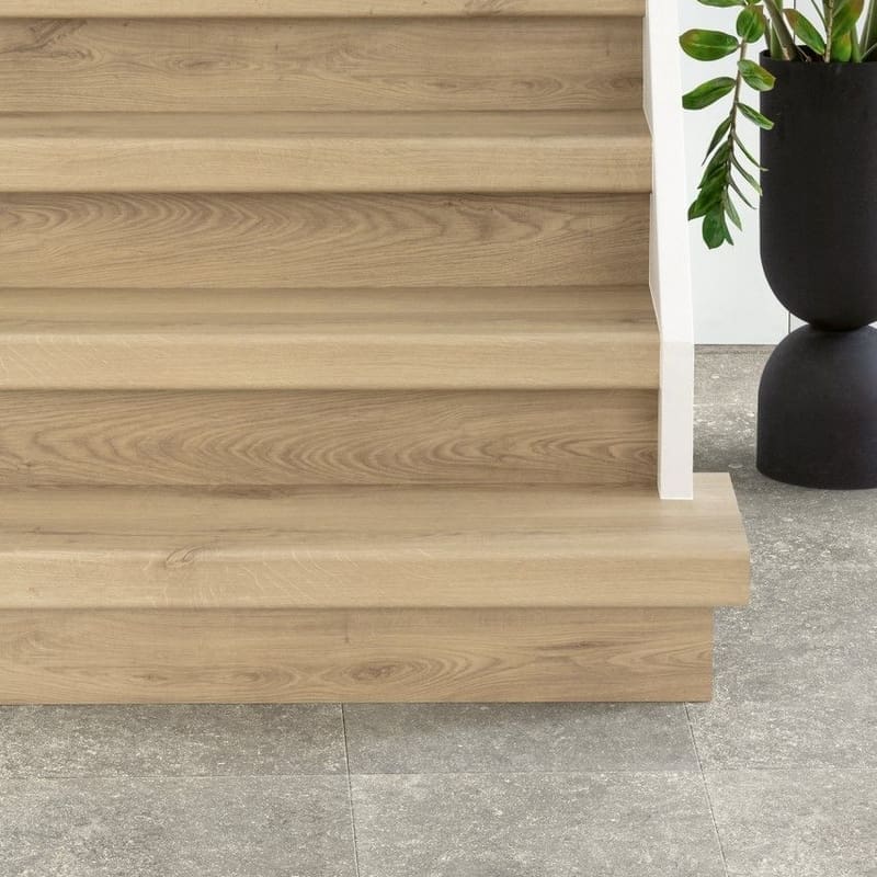 Hallway with Dusky Bluestone laminate flooring leading to staircase