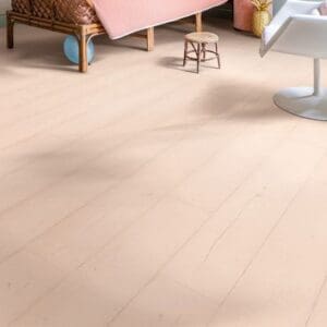 Painted Oak Rose laminate in bedroom setting with pastel decor