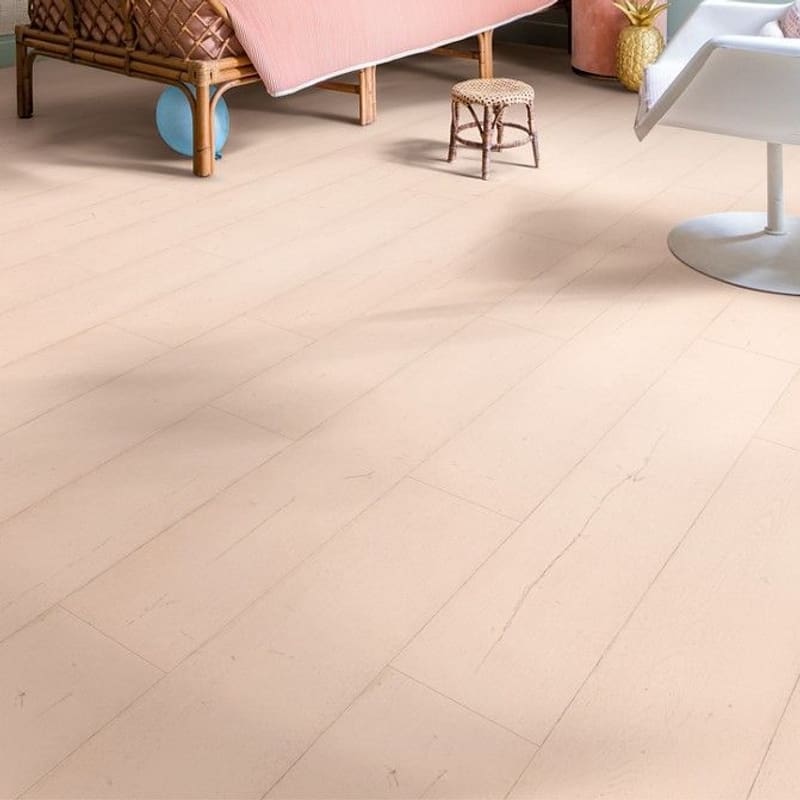 Painted Oak Rose laminate in bedroom setting with pastel decor