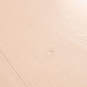 Close-up detail of Painted Oak Rose laminate showing wood grain texture