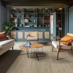 Close-up of Quick-Step Patina Oak Brown laminate showing detailed wood grain and texture
