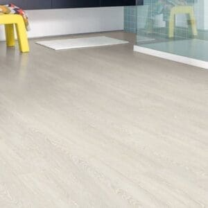 Modern bathroom with Quick-Step Impressive Patina Classic Oak Light laminate flooring installed