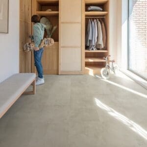 Kitchen with island featuring Quick-Step Grey Concrete Laminate flooring