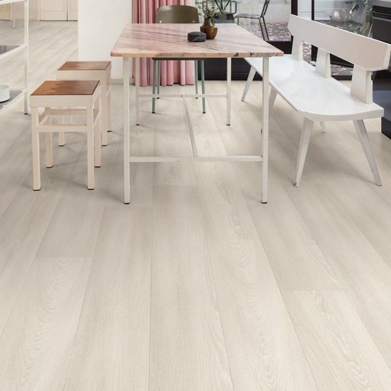 Modern dining area with White Premium Oak flooring and pink curtains