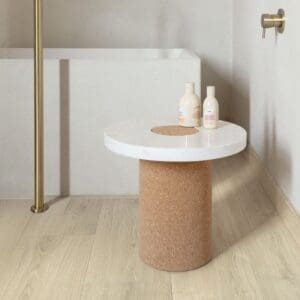 Contemporary bathroom with Quick-Step Brushed Oak Beige laminate flooring and white bathtub