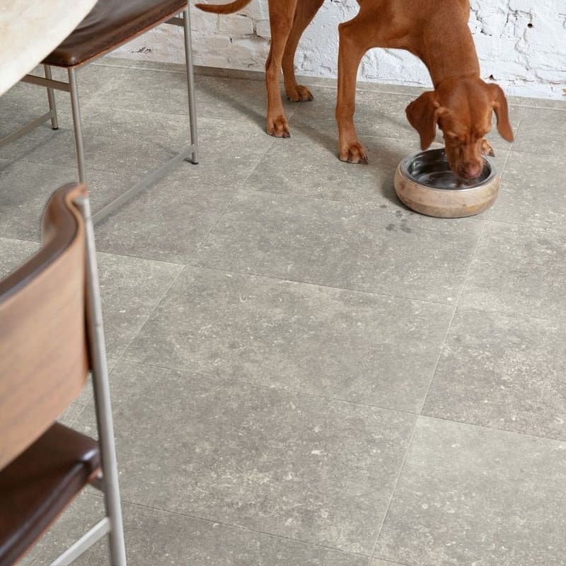 Modern dining area with Dusky Bluestone laminate flooring and pendant lighting