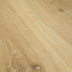 Close-up view of Quick-Step Creo Tennessee Oak Natural Laminate flooring showing wood grain texture and knot details