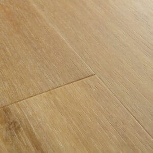 Detailed view of Quick-Step Canyon Oak Natural flooring showing texture and plank joints