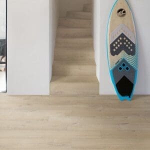 Attic bedroom with bamboo furniture and Quick-Step Soft Oak Medium laminate flooring
