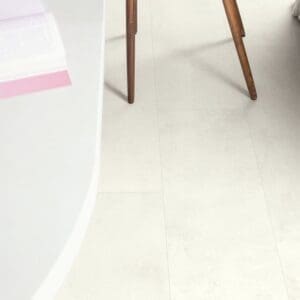 Wooden chair on Quick-Step Muse Chalk Laminate Flooring MUS5487 displaying contrast with furniture