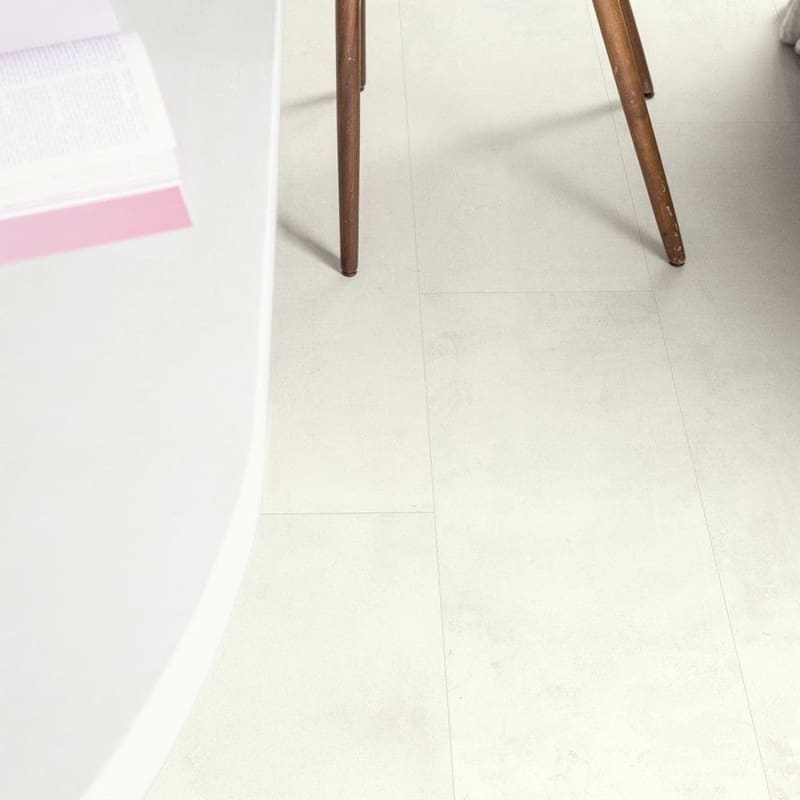 Wooden chair on Quick-Step Muse Chalk Laminate Flooring MUS5487 displaying contrast with furniture