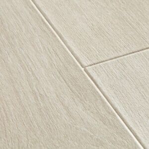 Close-up of Quick-Step Majestic Woodland Oak Light Grey laminate flooring showing beveled edge detail and texture