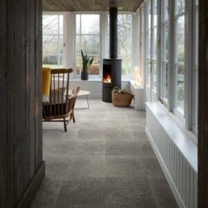 Staircase with wooden steps and Dusky Bluestone laminate flooring in hallway