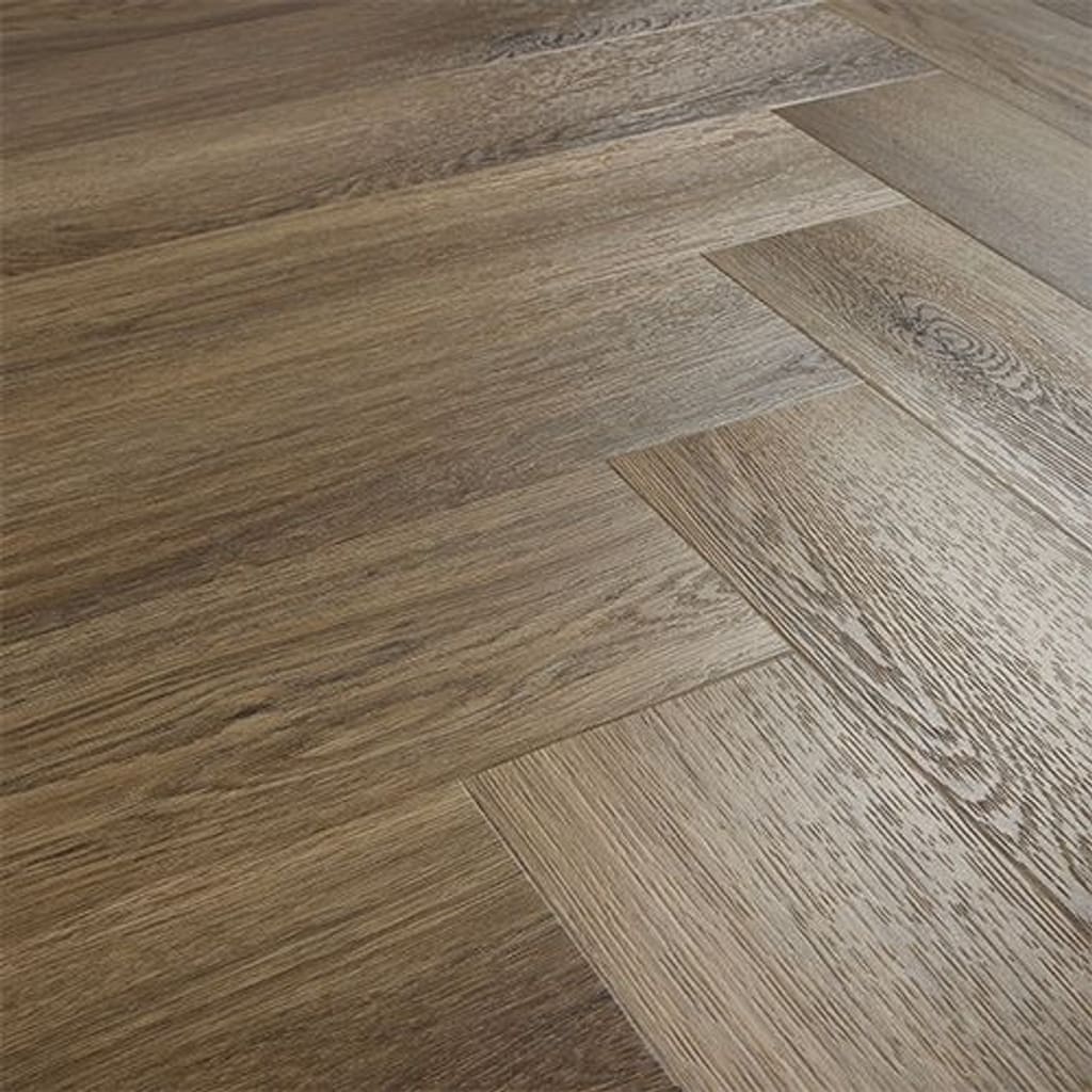 Angled view of the Antique Walnut herringbone flooring showing surface finish